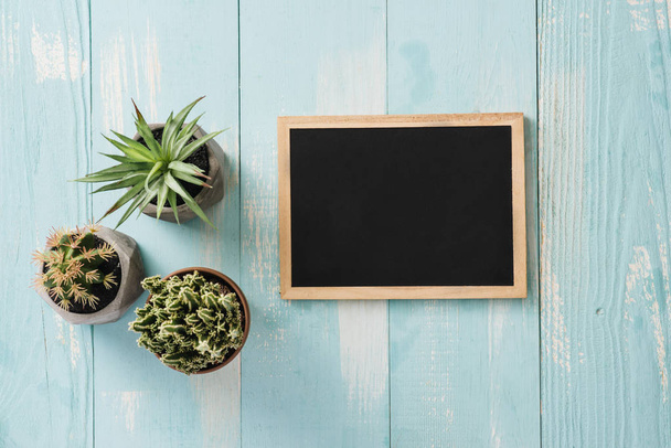 School vintage blackboard with chalk on a wooden desk, back to school concept - Φωτογραφία, εικόνα