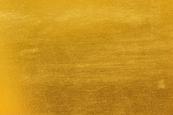 Fényes sárga levél arany fólia textúra háttér - Fotó, kép