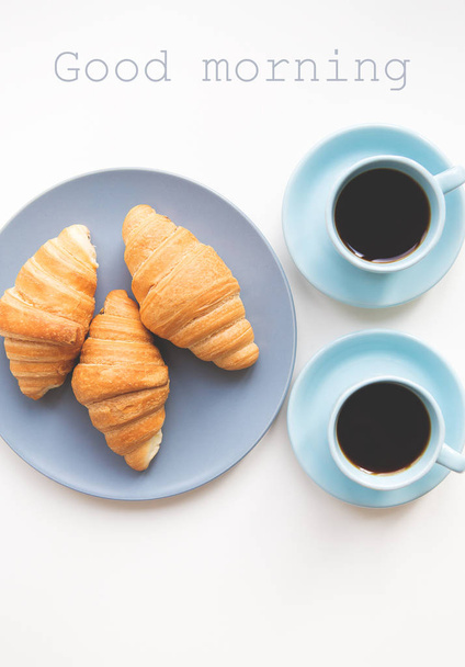 cup of coffee with croissant - Foto, afbeelding