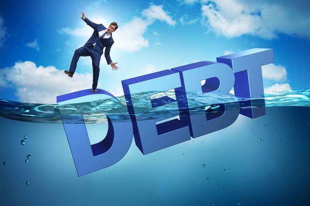 Бизнесмен в долговой бизнес-концепции - Фото, изображение
