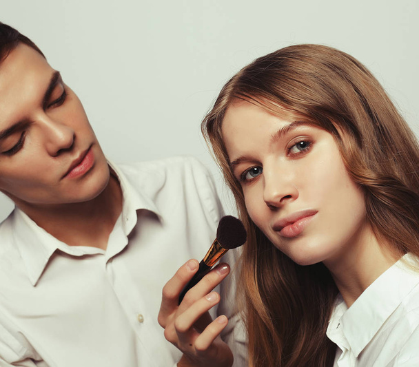 Beauty concept: Make-up artist doing makeup - Photo, Image