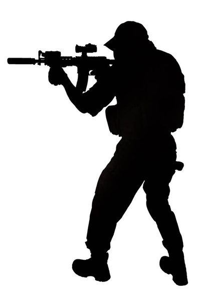 special forces operator with assault rifle black silhouette isolated - Foto, immagini