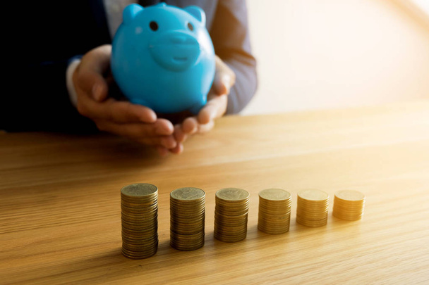 Businessmen saving money .finance concept . - Photo, Image