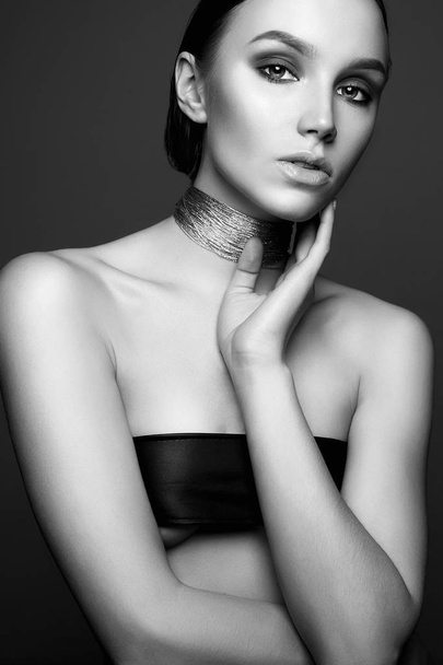 sexy Beautiful woman with necklace. Fashion studio portrait of beauty girl - 写真・画像