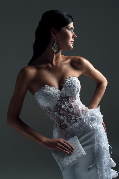 luxe bride in form-fitting dress, catalog photo - Foto, Bild