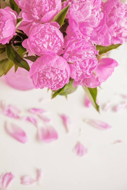Bouquet of delicate pink peony flowers on a light background. - Zdjęcie, obraz
