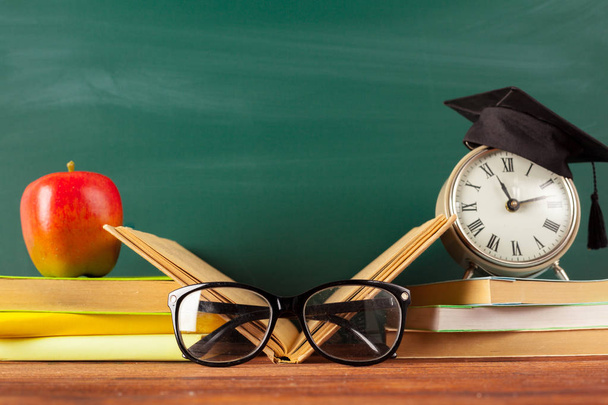 back to school - apple and books with pencils and blackboard - Φωτογραφία, εικόνα