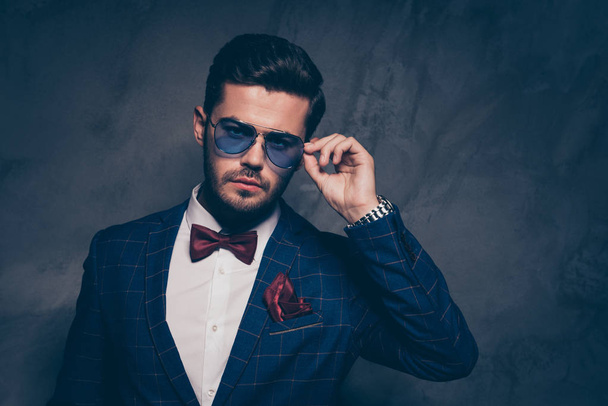 Closeup studio photo portrait of chic attractive virile masculine in white shirt maroon color tissue in pocket touching correcting glasses isolated grey dark background - Φωτογραφία, εικόνα
