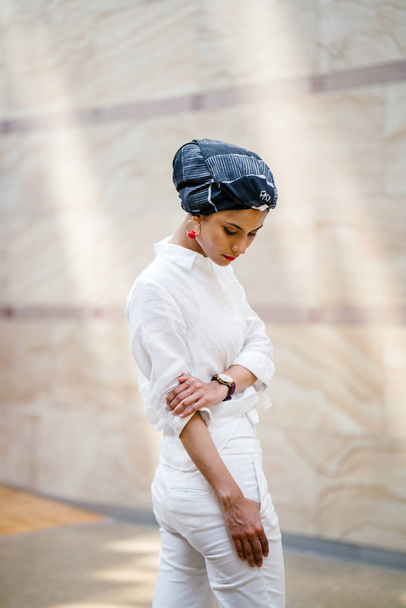 Portrait of a young Muslim woman wearing a turban (headscarf, hijab). She is elegant and  attractive - Φωτογραφία, εικόνα