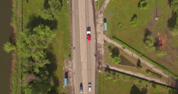 Top down aerial view of small crossroad in provincial town - Footage, Video