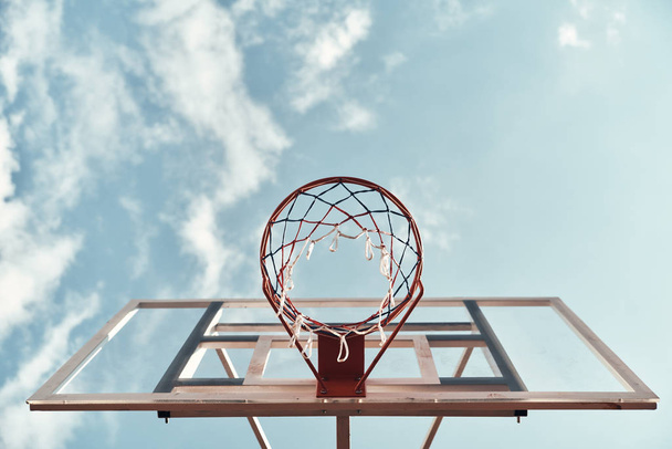 basketball hoop with sky on background, basketball net - Foto, afbeelding