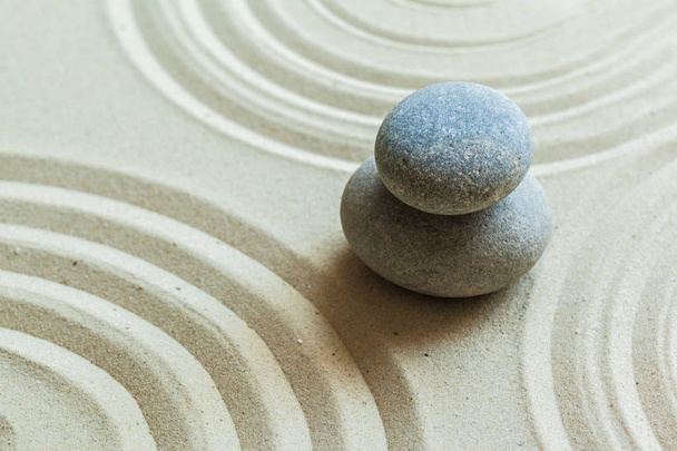 Zen stenen op zand achtergrond  - Foto, afbeelding