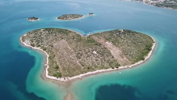 Aerial view of the island in the shape of a heart, Croatia, island of lovers, Otok Galesnnjak, islet, rock. Also called otok za Zaljubljene, island of love. Municipality of Torrette. - Footage, Video
