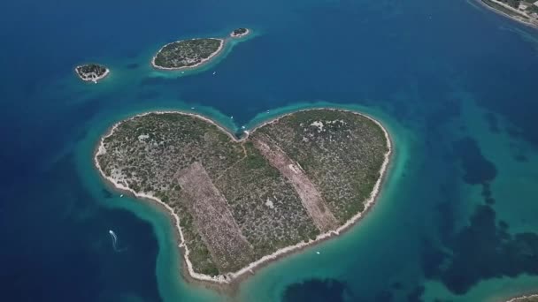 Aerial view of the island in the shape of a heart, Croatia, island of lovers, Otok Galesnnjak, islet, rock. Also called otok za Zaljubljene, island of love. Municipality of Torrette. - Footage, Video