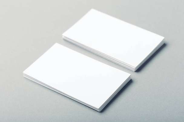 blank business cards on grey background - Foto, afbeelding