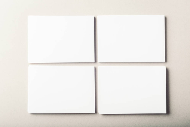 blank business cards on grey background - Foto, Imagen