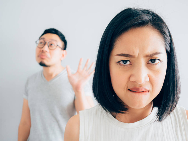 Annoyed Asian wife and funny tricky husband. - Fotó, kép