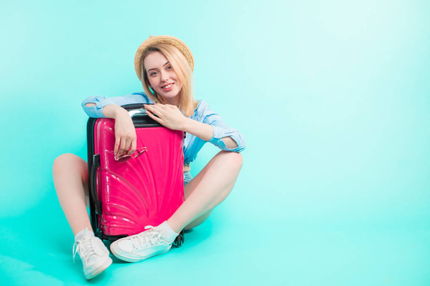 good-looking student with pink suitcase - Φωτογραφία, εικόνα