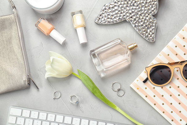 Flat lay composition with cosmetics and stylish accessories on light background - Photo, Image