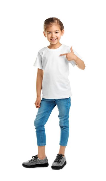 Little girl in t-shirt on white background. Mockup for design - Photo, image