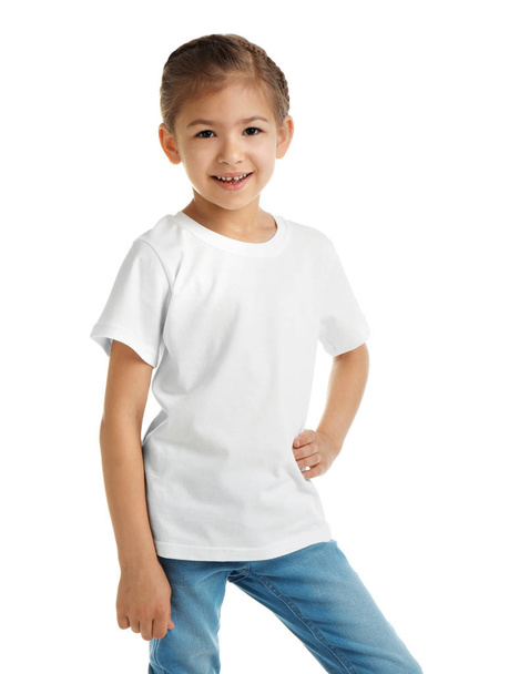 Little girl in t-shirt on white background. Mockup for design - Fotó, kép