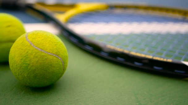 Close up of tennis equipment on the court. Sport, recreation concept. - Footage, Video