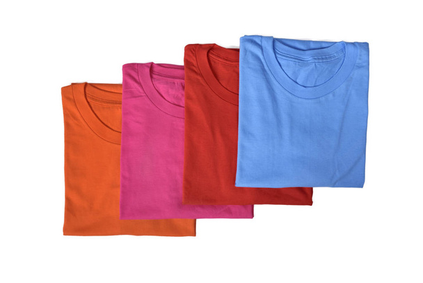 Row of colorful shirts isolated over white background - Foto, Imagem