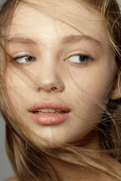 Close up portrait of beautiful teen girl with natural make up. Fashion style. Blonde hair - Fotoğraf, Görsel