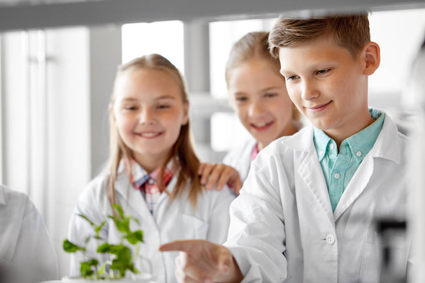 kids or students with plant at biology class - Valokuva, kuva