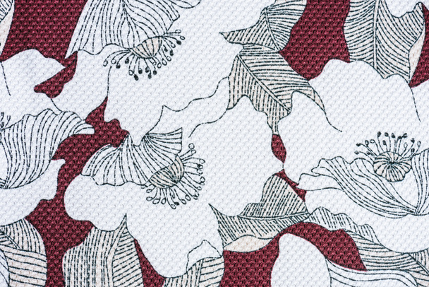 full frame image of textile fabric with pattern of flowers background - Photo, Image