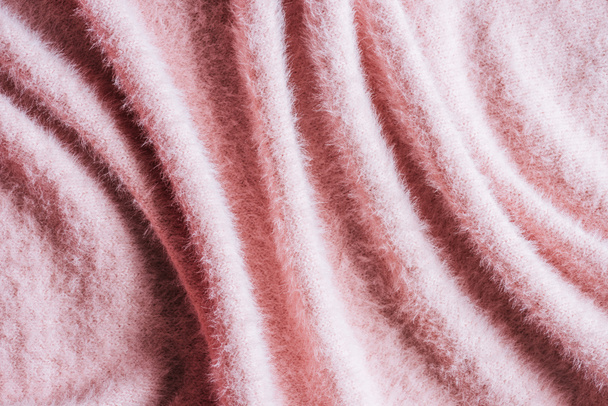 full frame image of pink fluffy woolen fabric background - Foto, Imagen