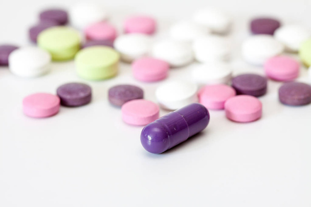 Multicolored vitamin pills isolated on white background. - Foto, Imagem