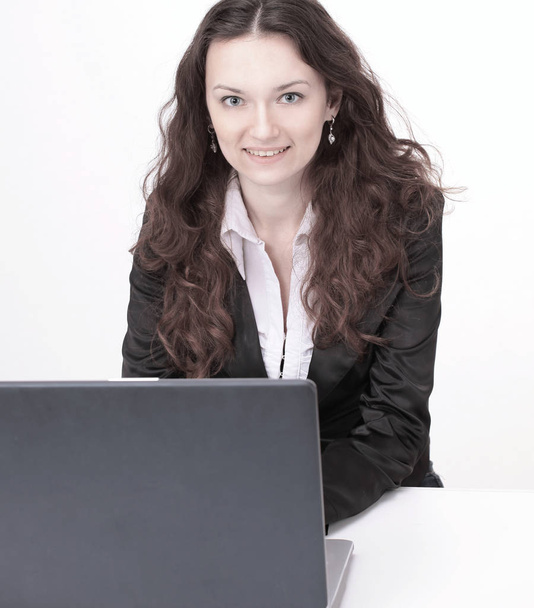 closeup.business woman working on laptop .isolated on white - Φωτογραφία, εικόνα