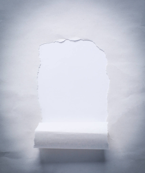 torn piece of paper on white background. background for advertising text - Φωτογραφία, εικόνα