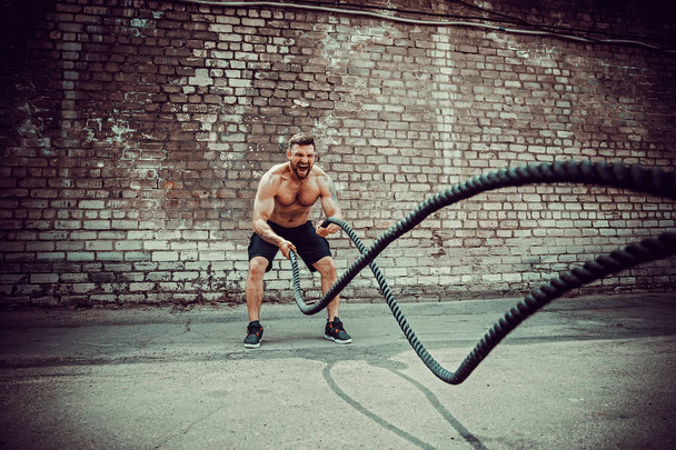 Men with rope, functional training - Foto, immagini