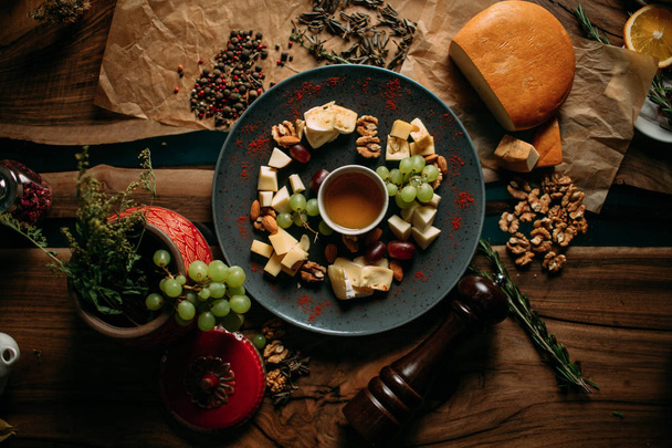 Honey and fruits on table  - Zdjęcie, obraz