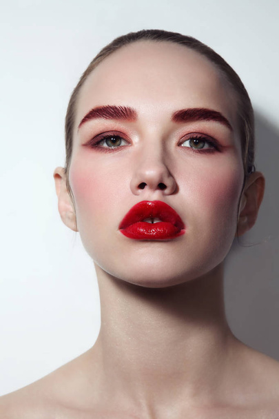 Young beautiful glamorous woman with red lipstick - Фото, зображення