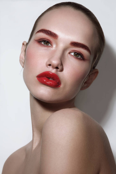 Young beautiful glamorous woman with red lipstick - Фото, зображення
