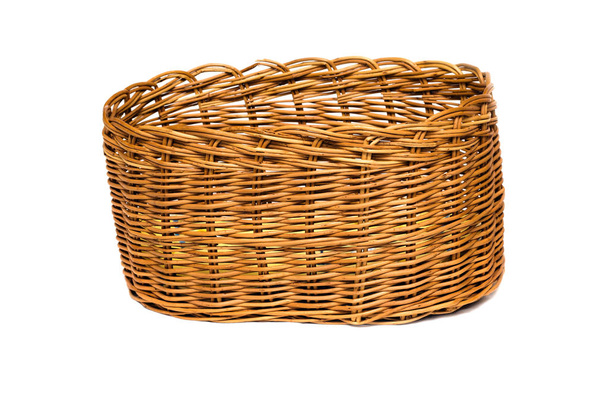 Yellow wicker basket made from a vine on a white background, isolated - Photo, Image