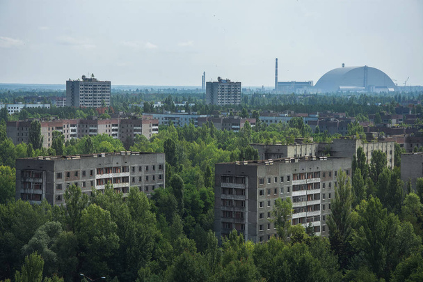 Praça central na cidade abandonada de Pripyat na Zona de Exclusão de Chernobyl, Ucrânia
 - Foto, Imagem