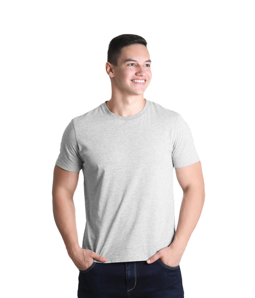 Young man in grey t-shirt on white background. Mockup for design - Фото, зображення