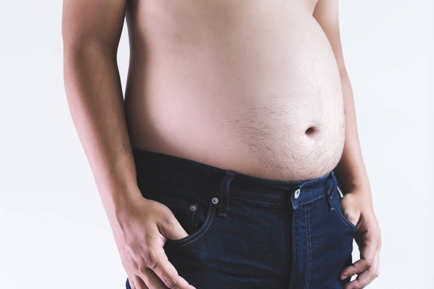 Man touching his fat belly chubby - Fotó, kép