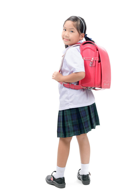 学校コンセプトに、白い背景で隔離の学校のバッグとかわいいアジア学生 - 写真・画像