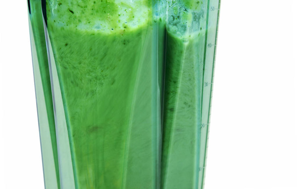 Green smoothie. Blending ingredients for green smoothie with whi - Photo, Image