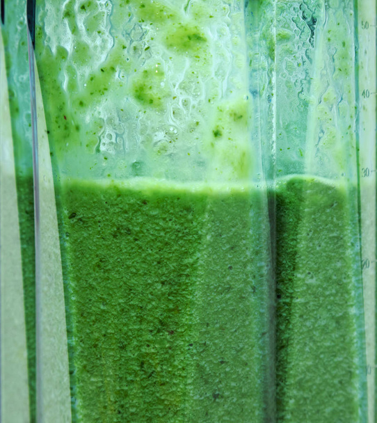 Green smoothie. Smoothie in blender closeup.  - Photo, Image