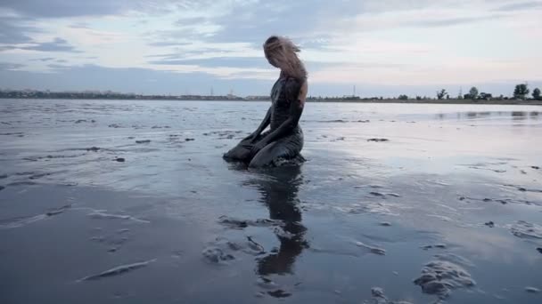 Adorable Slender Blonde Get Smeared with a Black Mud looks like Petroleum Oil - Footage, Video