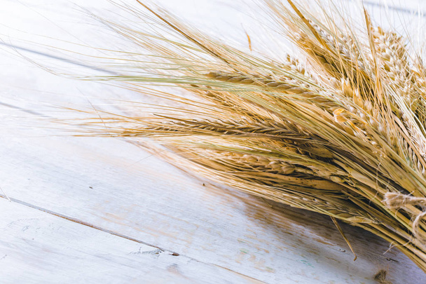 wheat on the wooden background - Fotó, kép