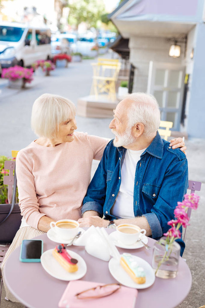 Appealing senior couple sharing love - Foto, afbeelding