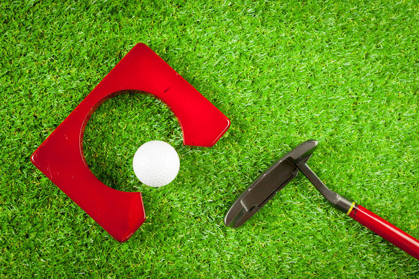 Mini golf equipment on green grass - Фото, зображення