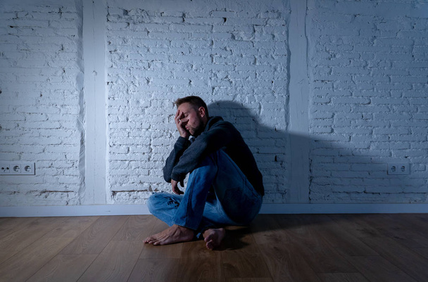 Lonely man suffering from depression - Фото, зображення